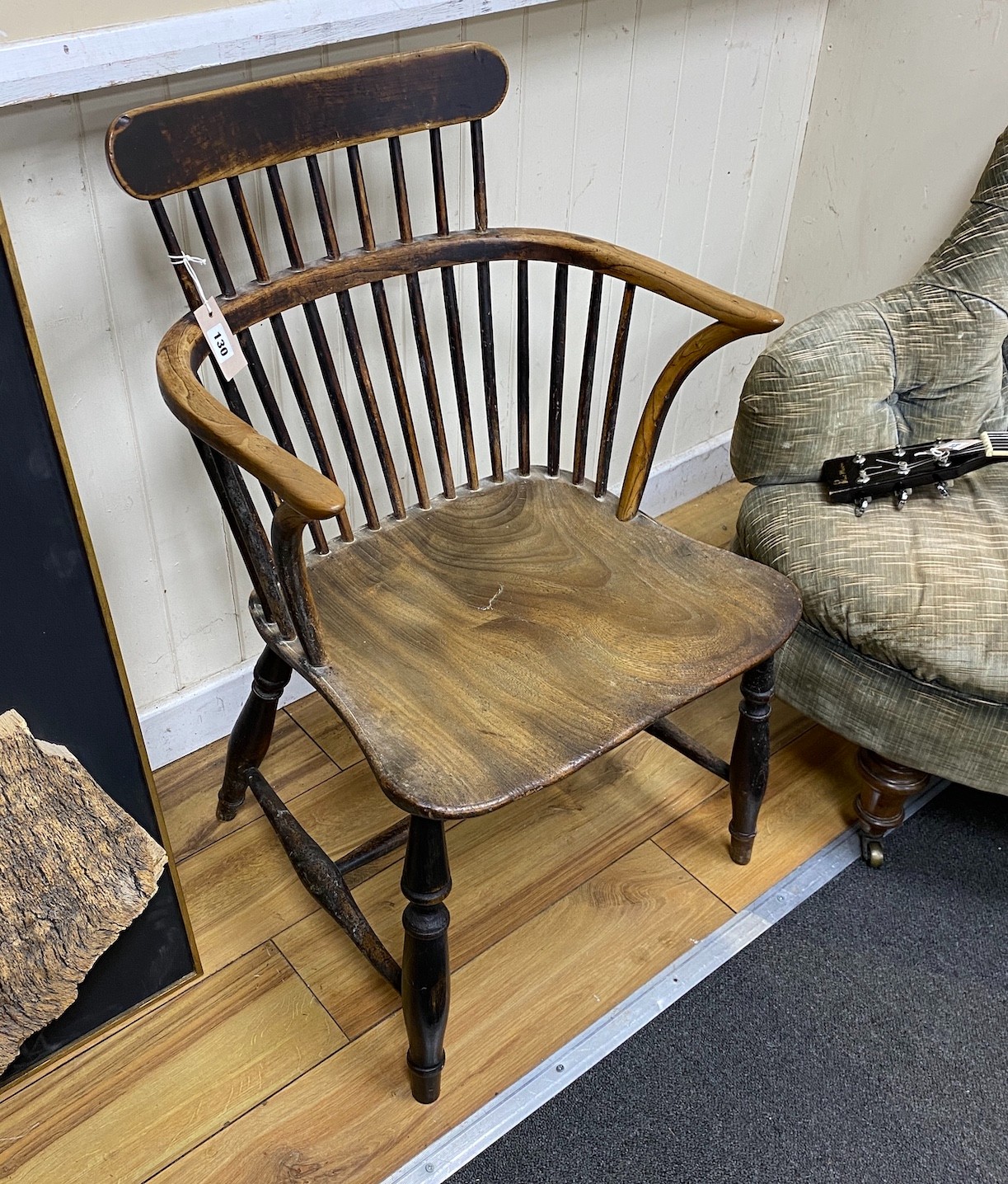 A mid 19th century Windsor ash, elm and beech comb back elbow chair, width 52cm, depth 41cm, height 86cm